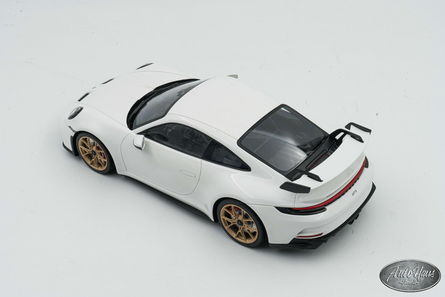 1/18 Minichamps Porsche 911 (992) GT3 Chalk White with Gold Wheels